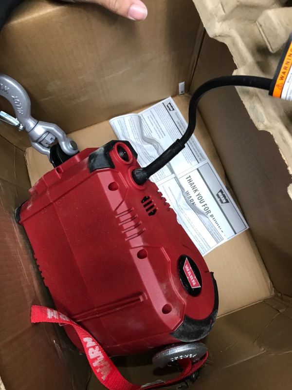 Photo 2 of WARN 885000 PullzAll Corded 120V AC Portable Electric Winch with Steel Cable: 1/2 Ton (1,000 Lb) Pulling Capacity , Red