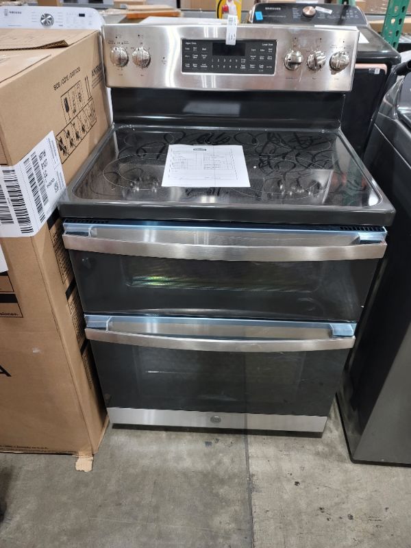 Photo 2 of GE - 6.6 Cu. Ft. Freestanding Double Oven Electric Convection Range with Self-Steam Cleaning and No-Preheat Air Fry - Stainless Steel
