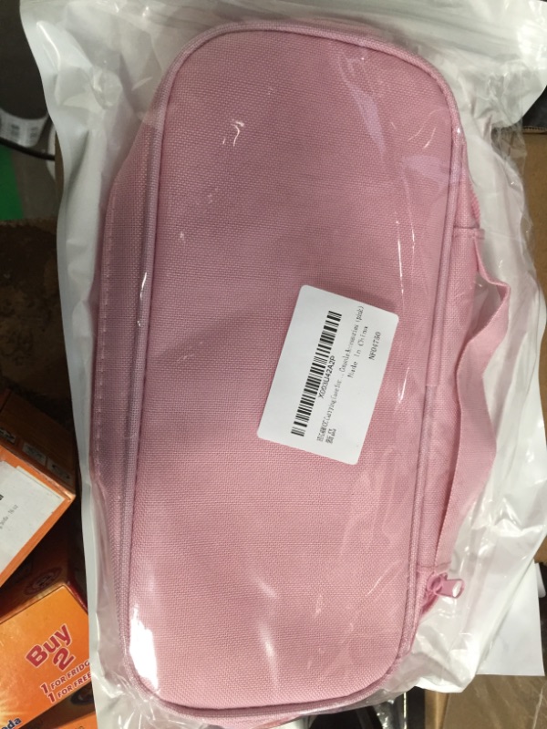 Photo 1 of CARRYING CASE FOR CONSOLE ACCESSORIES PINK 