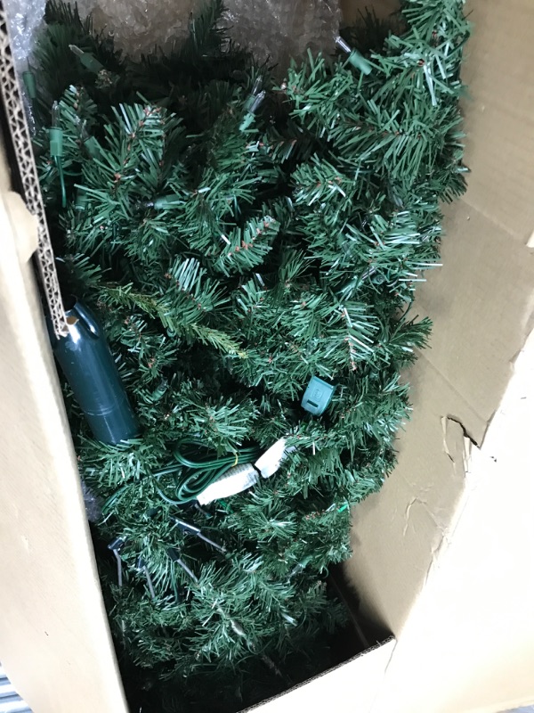 Photo 2 of National Tree Company Pre-lit 'Feel Real' Artificial Full Downswept Christmas Tree, Green, Douglas Fir, White Lights, Includes Stand, 7 feet 7 ft Christmas Tree