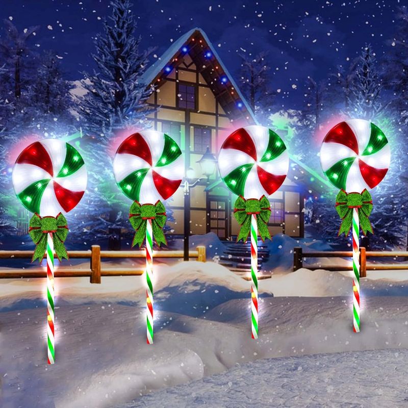 Photo 1 of 4 Pack 27.5" Lollipop Peppermint Christmas Pathway Lights Outdoor with Bows, Green Red White 80 LED Candy Cane Lights 8 Modes Timer Waterproof, Walkway Markers for Xmas Outsides Garden Yard Decoration
