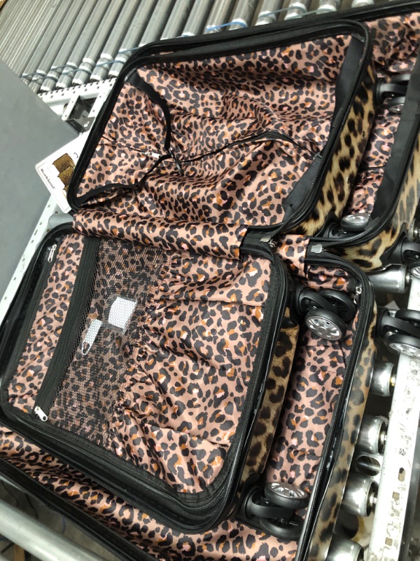 Photo 4 of **MISSING THE LARGEST ONE**   Rockland Safari Hardside Spinner Wheel Luggage, Leopard, 3-Piece Set (20/24/28) 3-Piece Set (20/24/28) Leopard