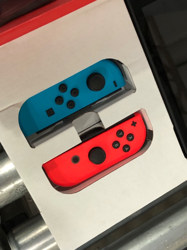 Photo 3 of *********Missing Pieces- No joy-con straps or HDMI cord included********.Nintendo Switch™ with Neon Blue and Neon Red Joy?Con™