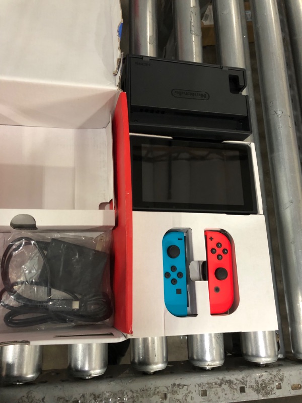 Photo 4 of *********Missing Pieces- No joy-con straps or HDMI cord included********.Nintendo Switch™ with Neon Blue and Neon Red Joy?Con™