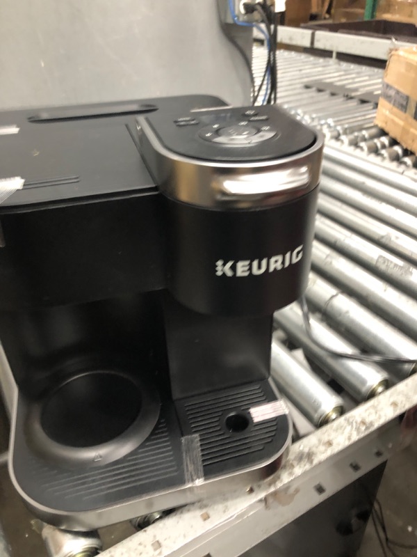 Photo 1 of Keurig K-Duo Special Edition Coffee Maker, Single Serve and 12-Cup Drip Coffee Brewer, Compatible with K-Cup Pods and Ground Coffee, Silver
