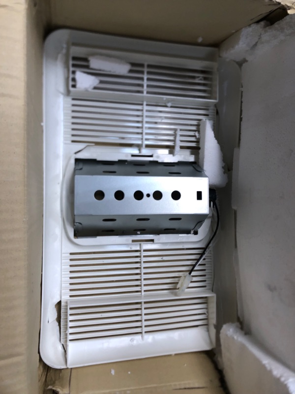 Photo 2 of **DAMAGE**Utilitech Heater 1.5-Sone 80-CFM White Lighted Bathroom Fan and Heater
