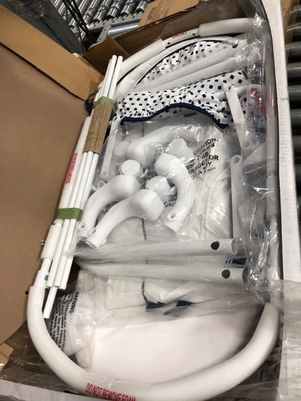 Photo 1 of Delta Children Smooth Glide Bedside Bassinet - Portable Crib with Lights, Sounds and Vibrations, Marina