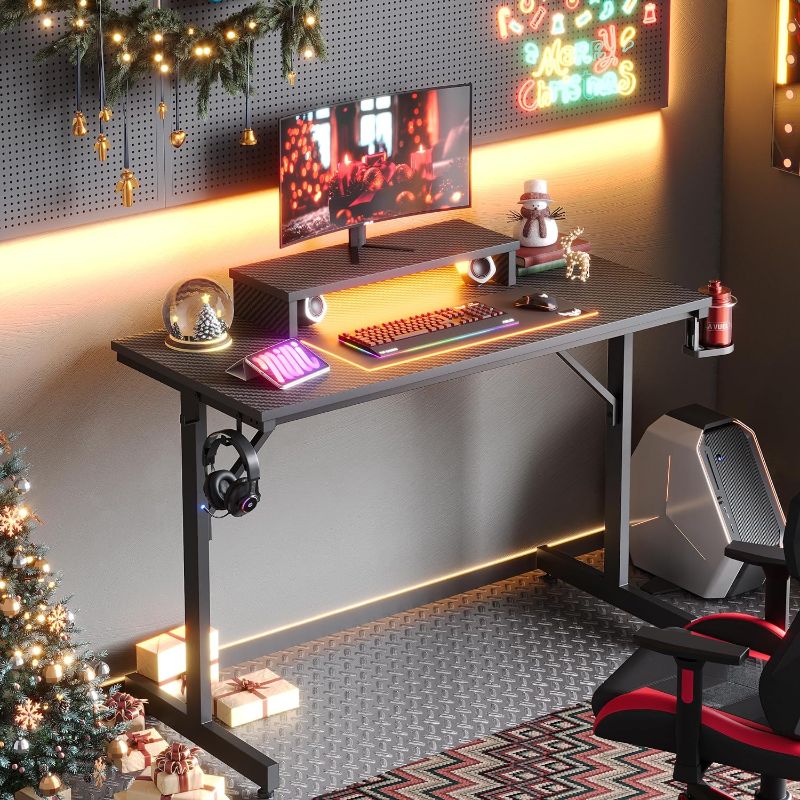Photo 1 of 
Bestier Small Gaming Desk with Monitor Stand, 42 inch LED Computer Desk, Gamer Workstation with Cup Holder & Headset Hooks, Modern Simple Style Desk for...
Color:42"
Size:Carbon Fiber Black