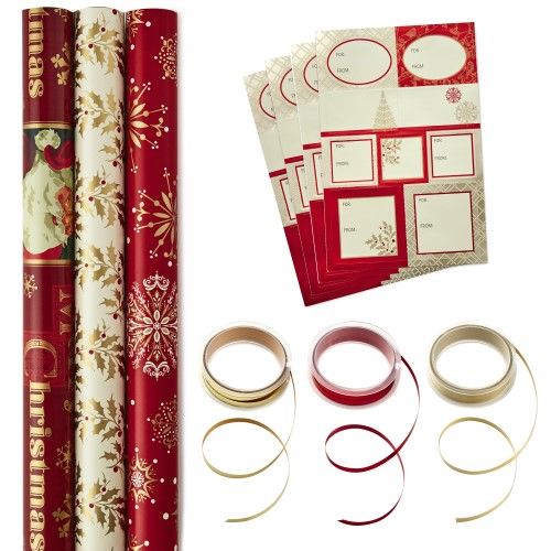 Photo 1 of Hallmark Reversible Christmas Wrapping Paper Set with Ribbon and Gift Tag Stickers (Traditional Red and Gold, 3 Rolls of Wrapping Paper and Ribbon)