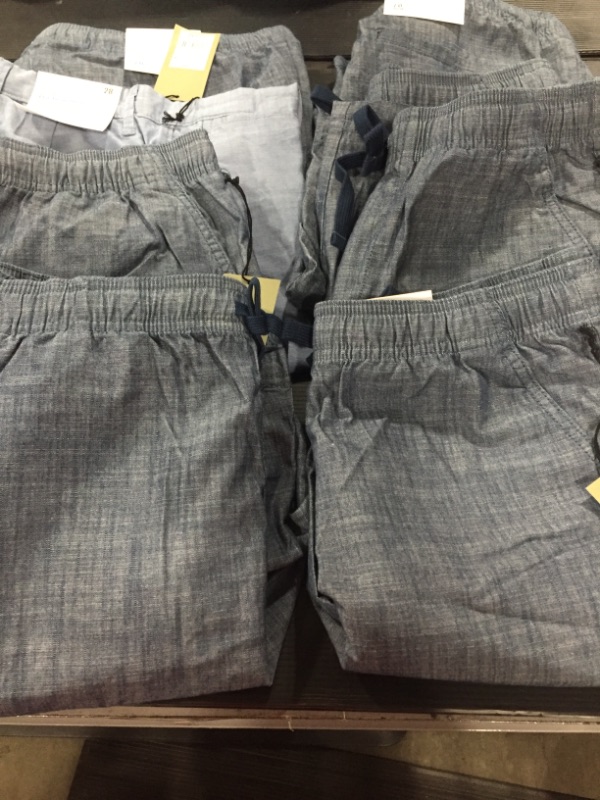 Photo 1 of Box of miscellaneous tops and bottoms