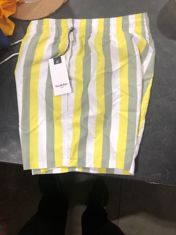 Photo 1 of GOODFELLOW YELLOW STRIPED SWIM TRUNKS SMALL