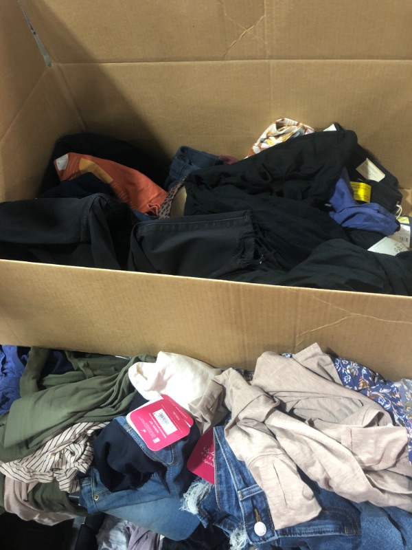 Photo 1 of BOX OF MISCELLANEOUS CLOTHING OF VARIOUS SIZES COLORS AND STYLES SOLD AS IS