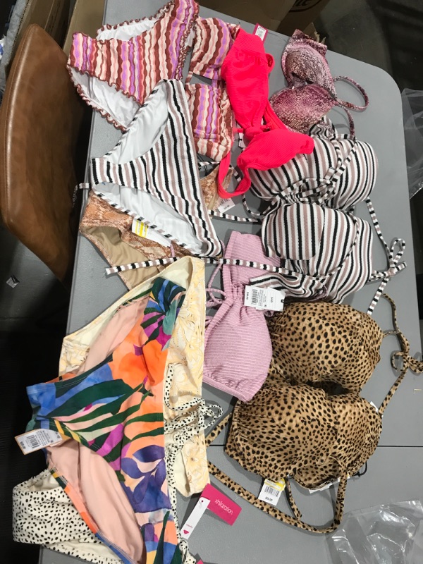 Photo 1 of BUNDLE OF BIKINIS AND BOTTOMS SIZES VARY 