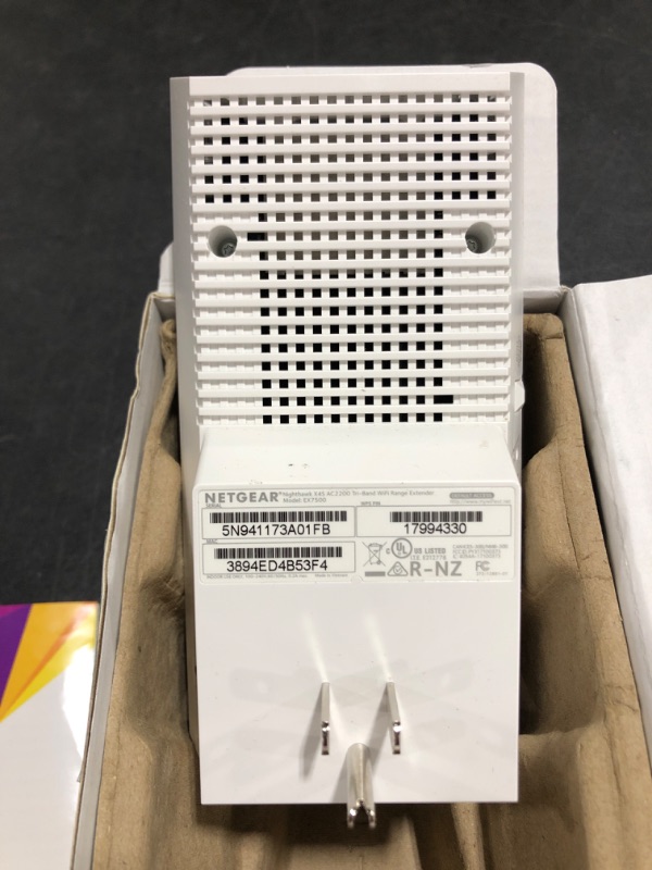 Photo 3 of NETGEAR WiFi Mesh Range Extender EX7500 - Coverage up to 2300 sq.ft. and 45 devices with AC2200 Tri-Band Wireless Signal Booster & Repeater (up to 2200Mbps speed), plus Mesh Smart Roaming. OPEN BOX. PRIOR USE. 
