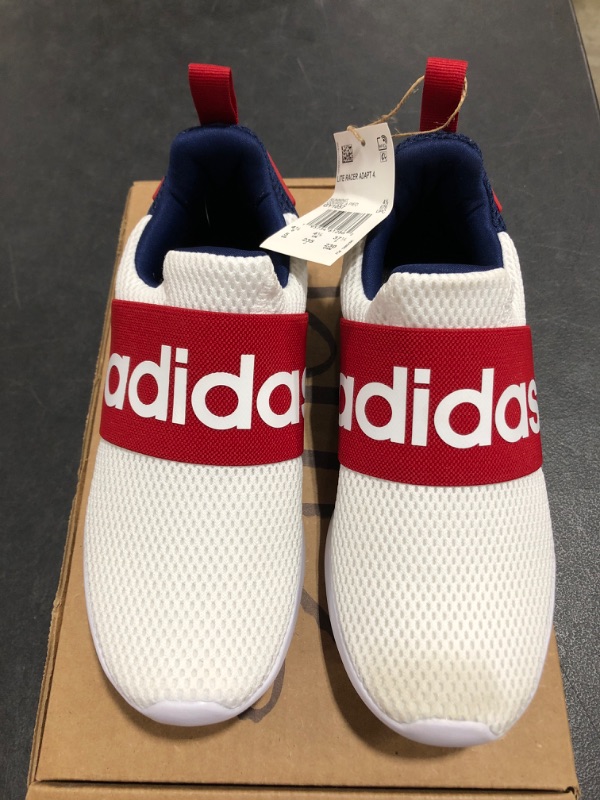 Photo 2 of Adidas Big Kids' Essentials Lite Racer Adapt 4.0 Casual Shoes in White/Cloud White Size 5.0. STAIN ON TOE.
