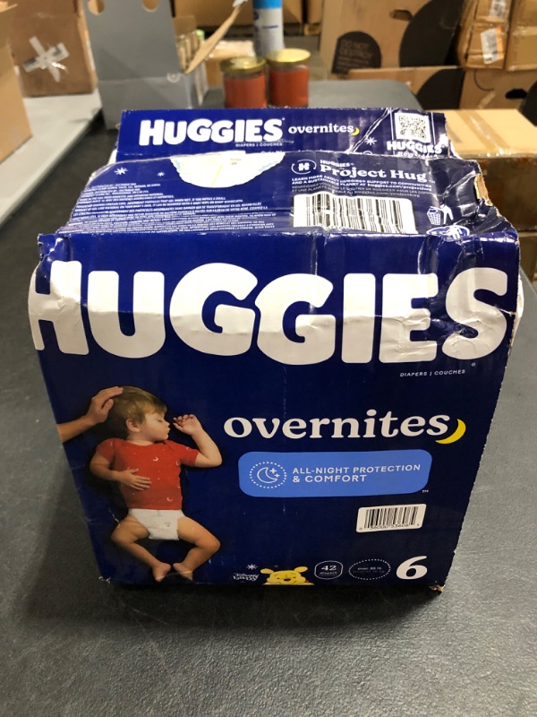 Photo 2 of Huggies Overnites Nighttime Baby Diapers, Size 6, 42 Ct (1127551). MINOR BOX DAMAGE. 
