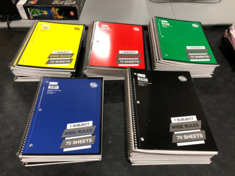 Photo 2 of LOT OF 48 - 70 SHEET SPIRAL NOTEBOOKS. WIDE RULED. VARIOUS COLORS. 