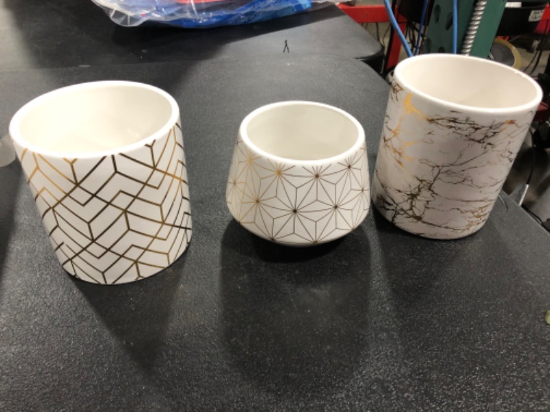 Photo 1 of 16 count of ceramic planters