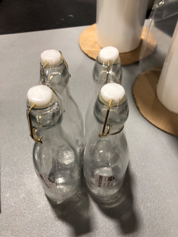 Photo 2 of 2 sets of 2 glass bottles (4 total)