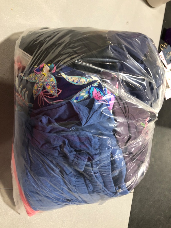 Photo 1 of Clothing lot. Various sizes of misc. clothing for men, women, and kids. Sold as is.