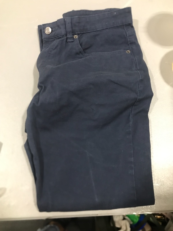 Photo 1 of AMAZON ESSENTIALS CHINO PANTS
 SIZE 33 X 28L