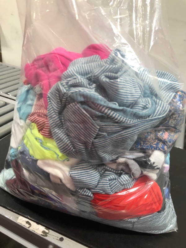Photo 1 of BAG BUNDLE OF WOMENS CLOTHING *SIZES AND STYLES VARY*