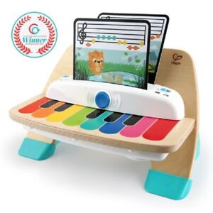 Photo 1 of BABY EINSTEIN HAPE MAGIC TOUCH PIANO WOODEN MUSICAL TODDLER TOY *DM
