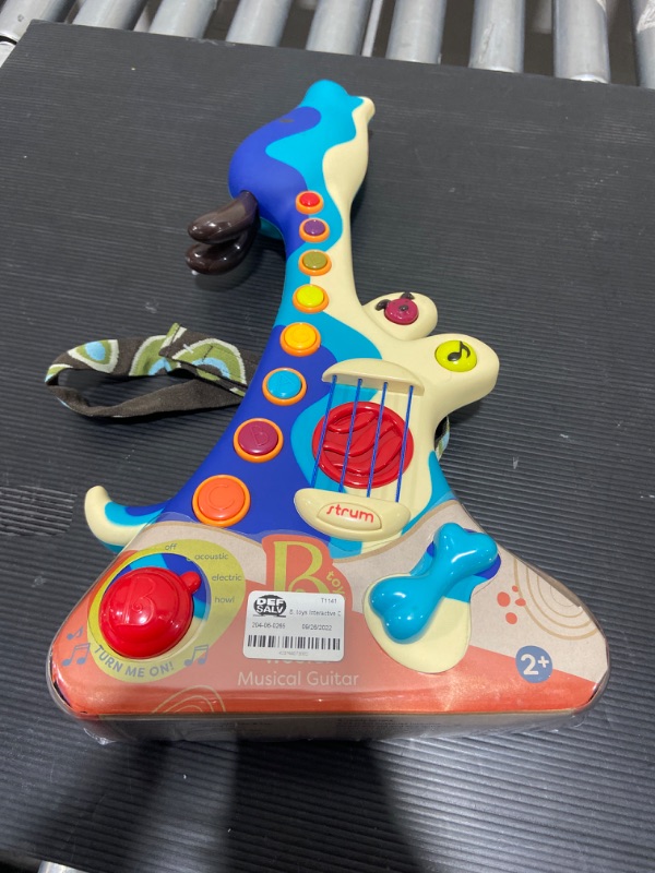 Photo 2 of B. Woofer Guitar - Teaches Musical Discovery Rhythm and Creativity - Includes 3 Play Modes 8 Musical Buttons and Twenty Sing-Along Favorites
