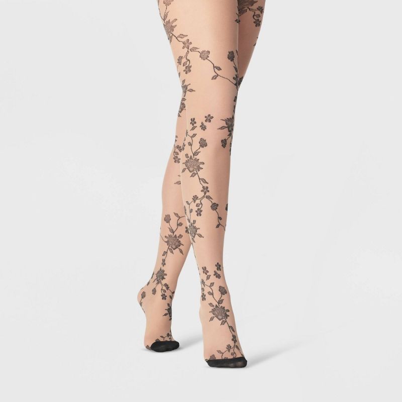 Photo 1 of 2 Women's Sheer Viney Floral Tights - a New Day™Size: M/L Color: honey beige/black adult
Material: Nylon