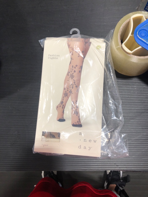 Photo 2 of 2 Women's Sheer Viney Floral Tights - a New Day™Size: M/L Color: honey beige/black adult
Material: Nylon