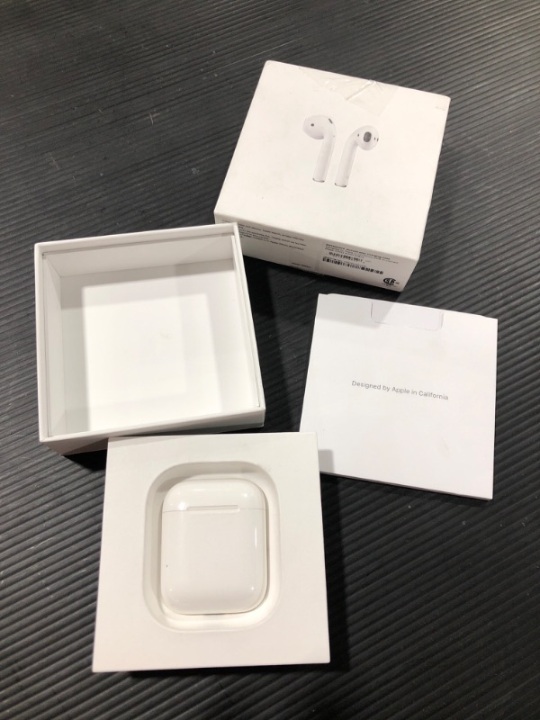 Photo 2 of Apple AirPods True Wireless Bluetooth Headphones (2nd Generation) with Charging Case
MISSING CHARGING CABLE 
