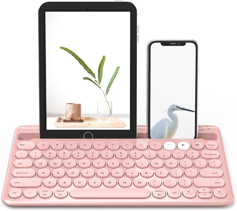 Photo 1 of Bluetooth Multi-Device Keyboard, Dual Channel Universal Rechargeable Wireless Keyboard with Integrated Stand for iPad Smartphone Tablet MacBook iOS Windows Android Devices - Pink
