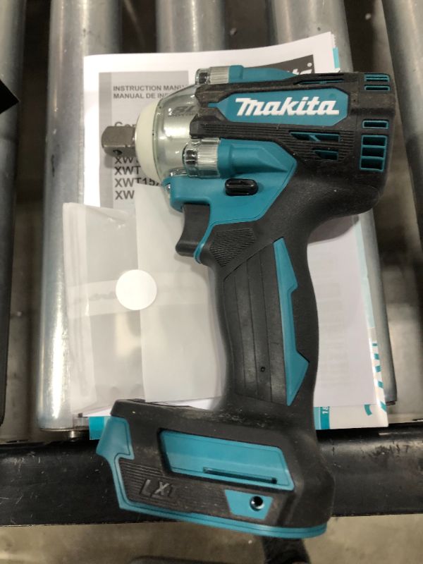 Photo 1 of 18V LXT Lithium-Ion Brushless Cordless 4-Speed 1/2 in. Impact Wrench with Detent Anvil (Tool-Only) NO BATTERY