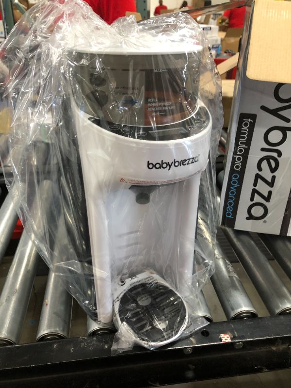 Photo 1 of New and Improved Baby Brezza Formula Pro Advanced Formula Dispenser Machine - Automatically Mix a Warm Formula Bottle Instantly - Easily Make Bottle with Automatic Powder Blending
