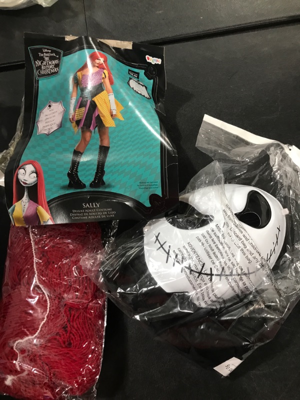 Photo 1 of Box lot of 2 Halloween nightmare before Christmas costumes. sally's costume size MEDIUM. Jack the skeleton costume size unknown. 