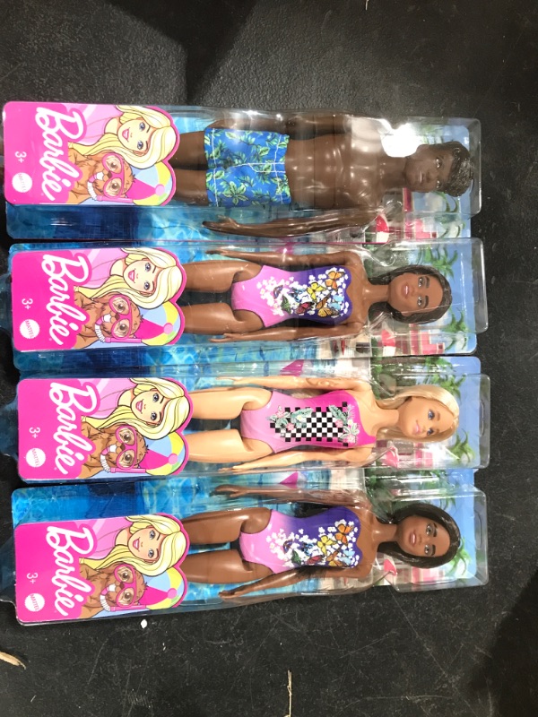 Photo 1 of A box lot of miscellanous Barbie dolls. Contains four 