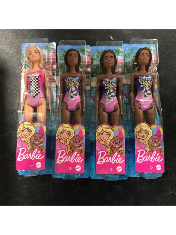 Photo 1 of A box lot of miscellanous Barbie dolls. Contains four 