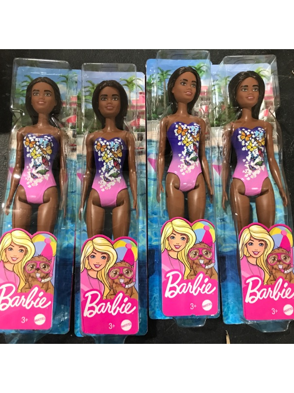 Photo 1 of A box lot of miscellanous Barbie dolls. Contains four 