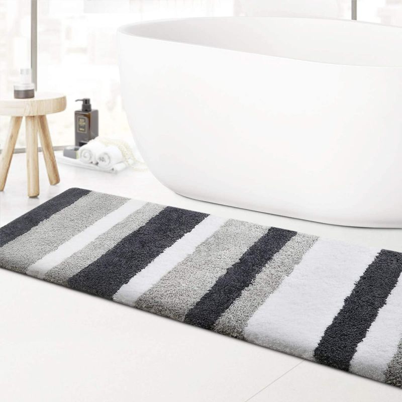 Photo 1 of KMAT Luxury Bathroom Rugs Bath Mat,20"x59", Non-Slip Fluffy Soft Plush Microfiber Shower Rug, Machine Washable Carpet Quick Dry Ultra Shaggy Bath Mats for Bathroom, Tub and Shower, White-Grey