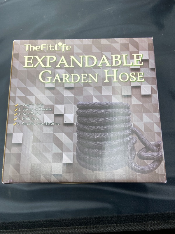 Photo 2 of TheFitLife Flexible and Expandable Garden Hose - Triple Latex Core with 3/4" Solid Brass Fittings and 8 Function Spray Nozzle, Easy Storage Kink Free Water Hose (50 FT)