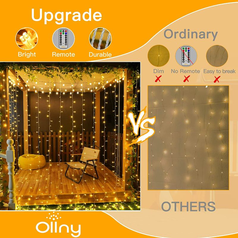 Photo 1 of Ollny Fairy Lights, 200 LED 6.6x6.6ft Curtain Lights with 8 Modes Timer & Remote, USB Powered Waterproof String Lights for Bedroom Party Wall Home Wedding Decorations(Warm White)