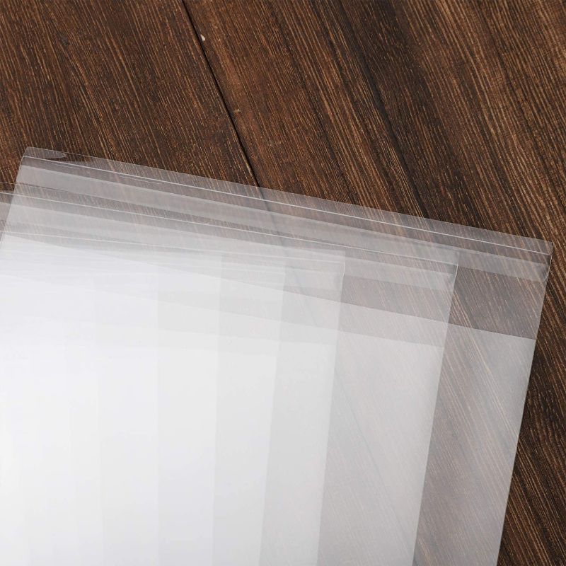 Photo 3 of 100 pcs Clear 9" x 12" Self Seal Cello Cellophane Bags Resealable Poly Bags 2.8 mils OPP Bag for Packaging Clothing, T Shirts, A4, Party Decorative Gift