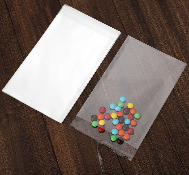 Photo 1 of 100 pcs Clear 9" x 12" Self Seal Cello Cellophane Bags Resealable Poly Bags 2.8 mils OPP Bag for Packaging Clothing, T Shirts, A4, Party Decorative Gift