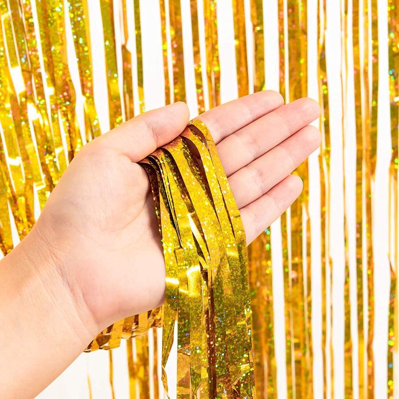 Photo 2 of       BRAVESHINE Gold Glitter Tinsel Foil Fringe Curtains - 2Pcs 3.2x8.2ft Holiday Photo Backdrop for Birthday Graduation Wedding Bridal Bachelorette Baby Shower Tropical Hawaiian Luau Party Decorations