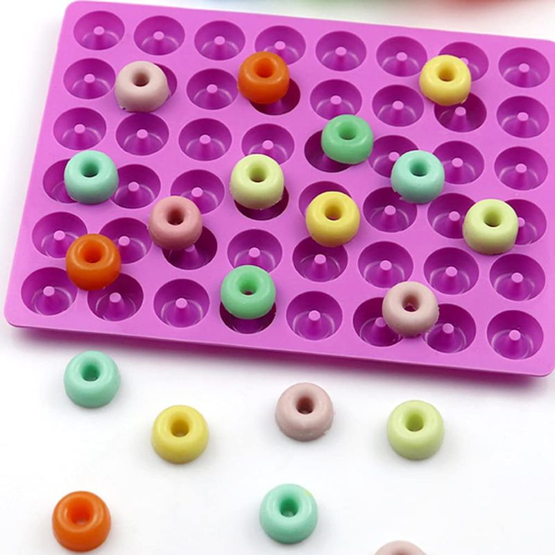 Photo 1 of JOERSH 4PCS Silicone Molds for Candy Gummy, Cake Decorating Fondant Chocolate Molds Mini Donut Pans, Fruit Loop Cereal Molds for Candles Soap Making