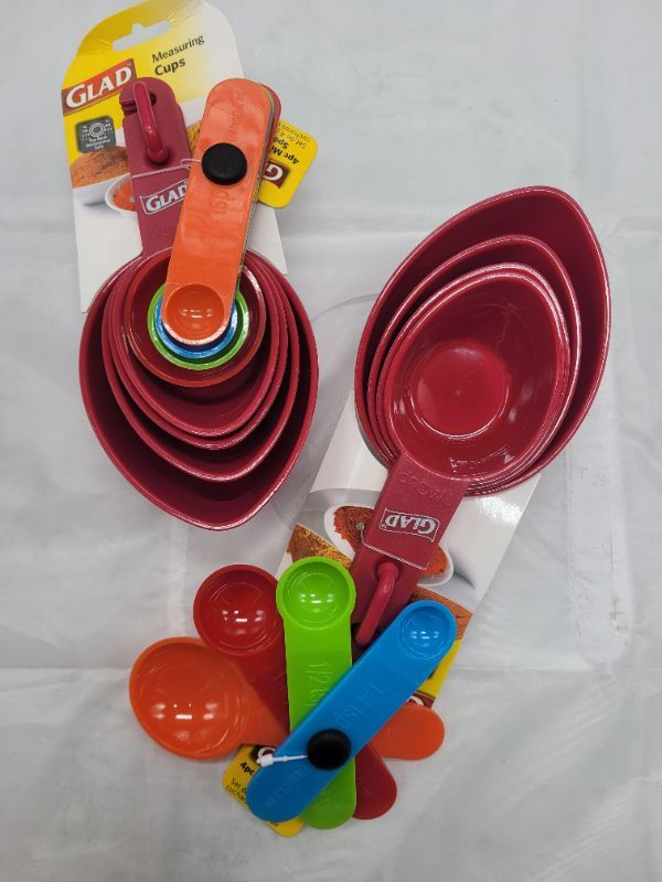 Photo 1 of GLAD -2 Red Measuring Cups and 2 Assorted Color Measuring Spoons 