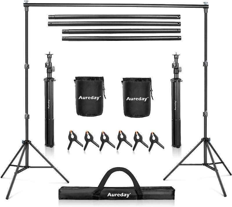 Photo 1 of Aureday Backdrop Stand, 7x10Ft Adjustable Photo Backdrop Stand Kit with 4 Crossbars, 6 Background Clamps, 2 Sandbags, and Carrying Bag