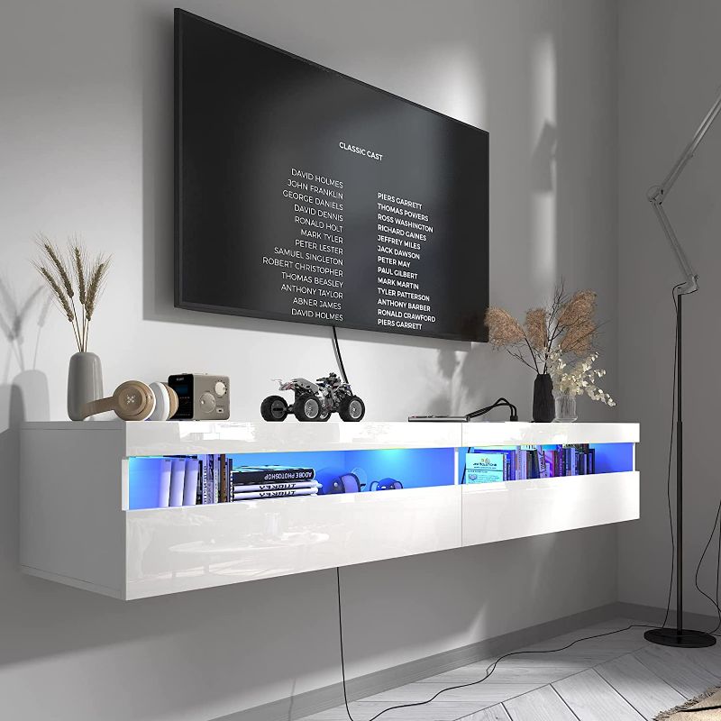 Photo 1 of EXQUAL Floating TV Stand with Led Lights & Power Outlet, 70'' High Gloss Wall Mounted Entertainment Center Console with Large Storage, Modern TV Media Console Cabinet for 60/65/70/80inch TV (White) USED
