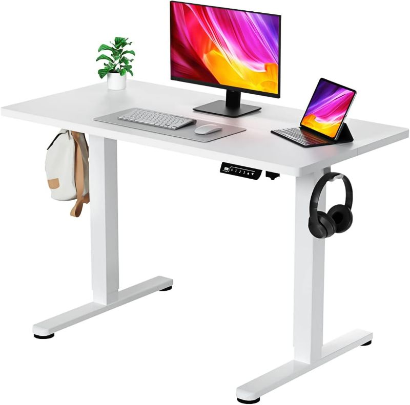 Photo 1 of Electric Standing Desk, 48 X 24 Inches Adjustable Height Desk, Modern Sit Stand Up Desk with Memory Controller and Hook, Ergonomic Rising Desk for Home Office, White