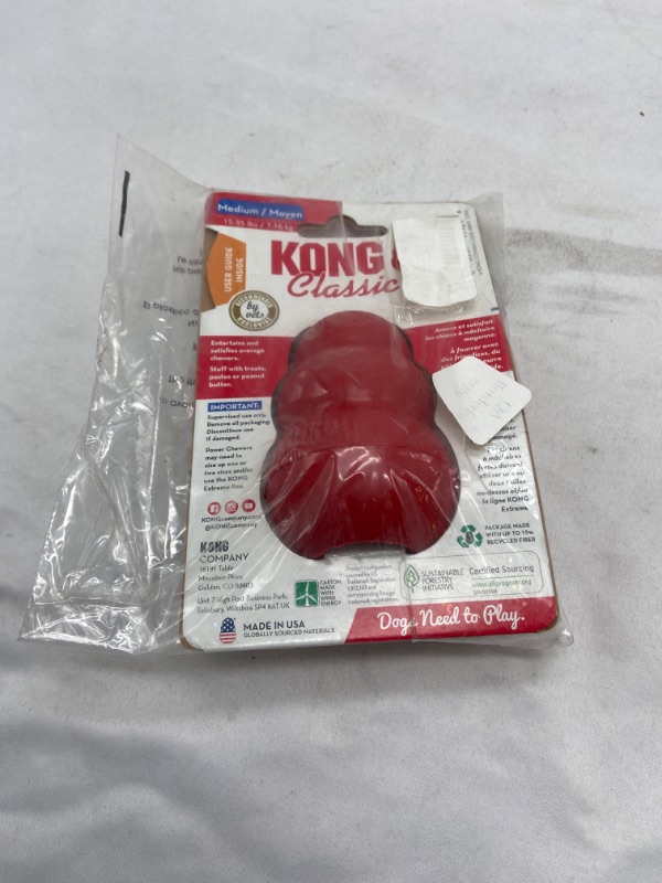 Photo 3 of KONG - Classic Dog Toy, Durable Natural Rubber- Fun to Chew, Chase and Fetch - for Medium Dogs
